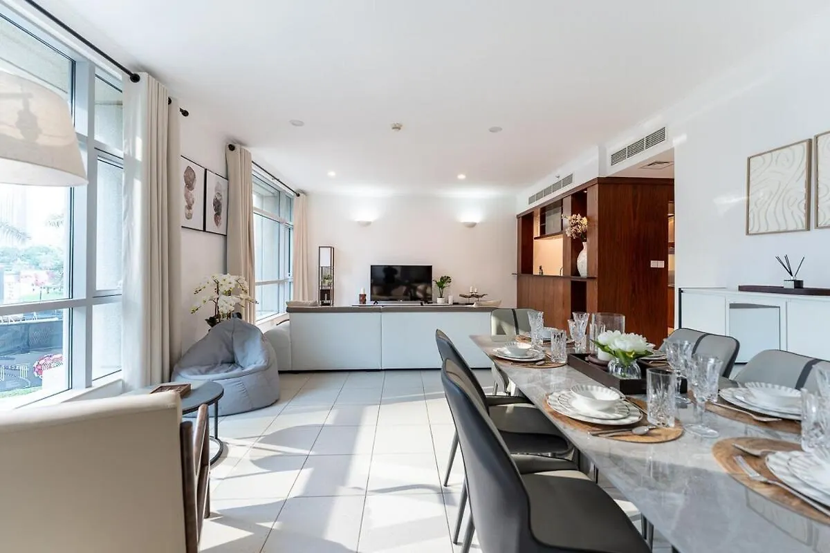 Chic 1-Bedroom Getaway With Downtown Living Charm Дубай ОАЭ