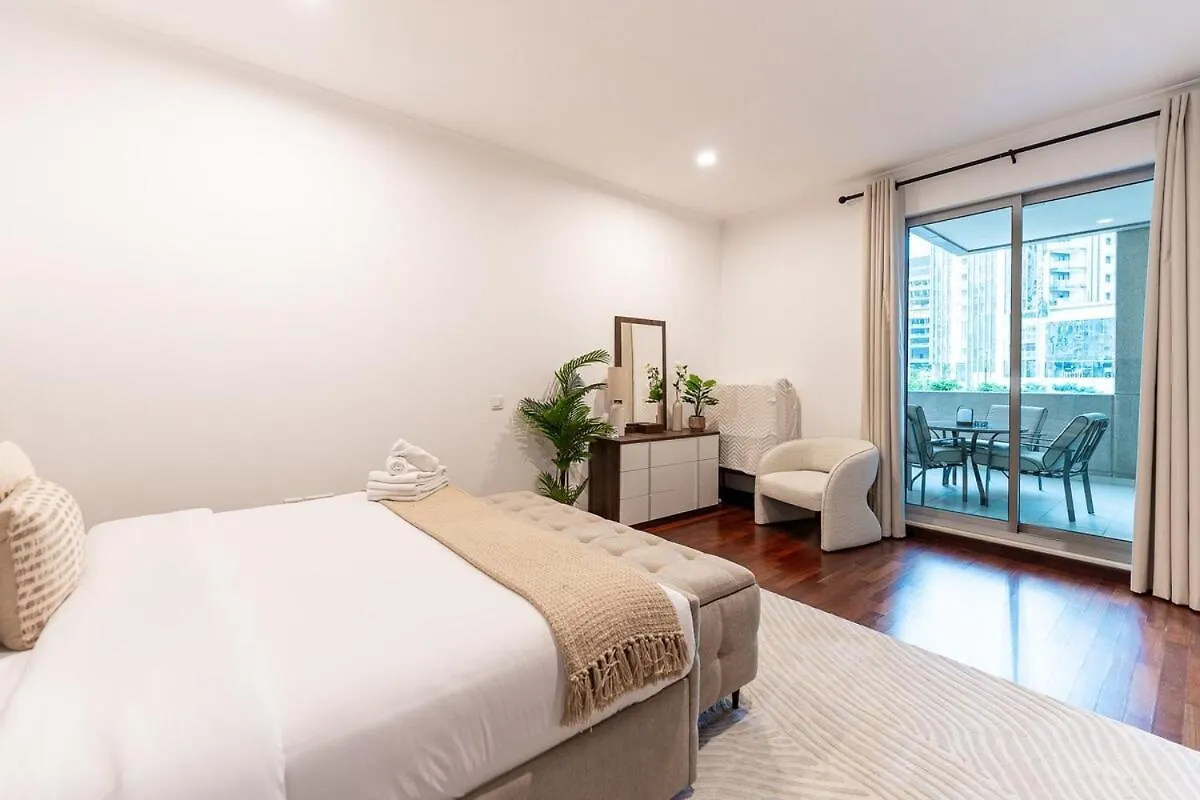 Апартаменты Chic 1-Bedroom Getaway With Downtown Living Charm Дубай
