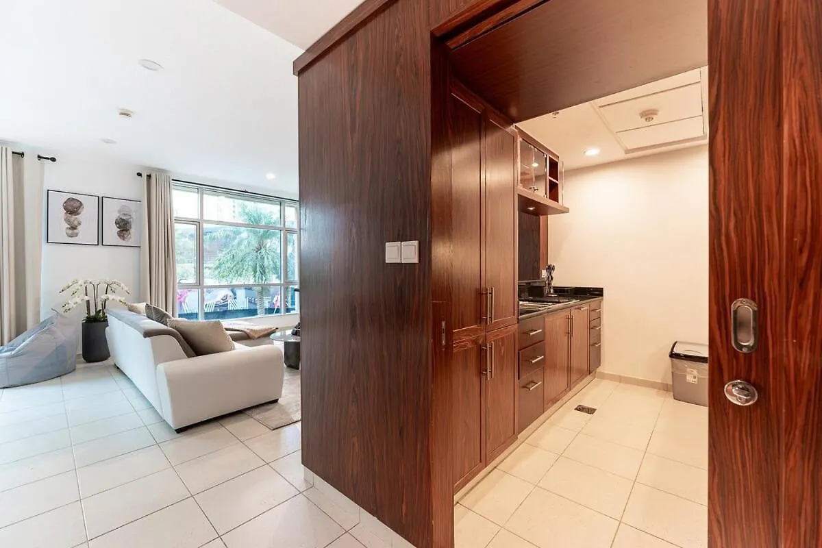 Chic 1-Bedroom Getaway With Downtown Living Charm Дубай 0*,
