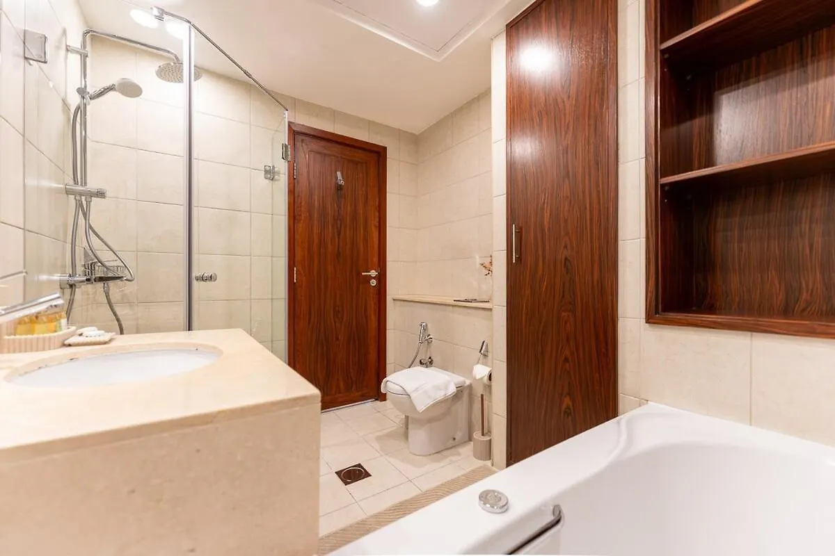 Апартаменты Chic 1-Bedroom Getaway With Downtown Living Charm Дубай