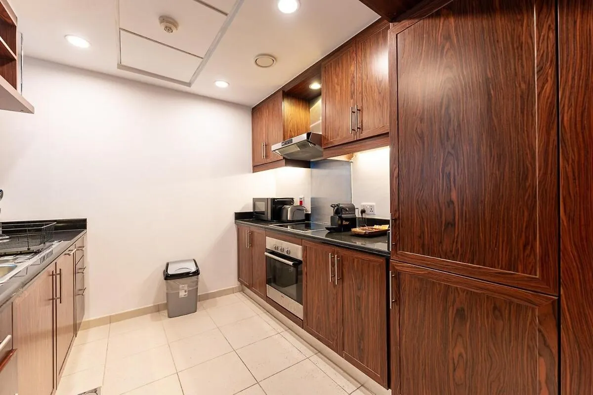 Chic 1-Bedroom Getaway With Downtown Living Charm Дубай
